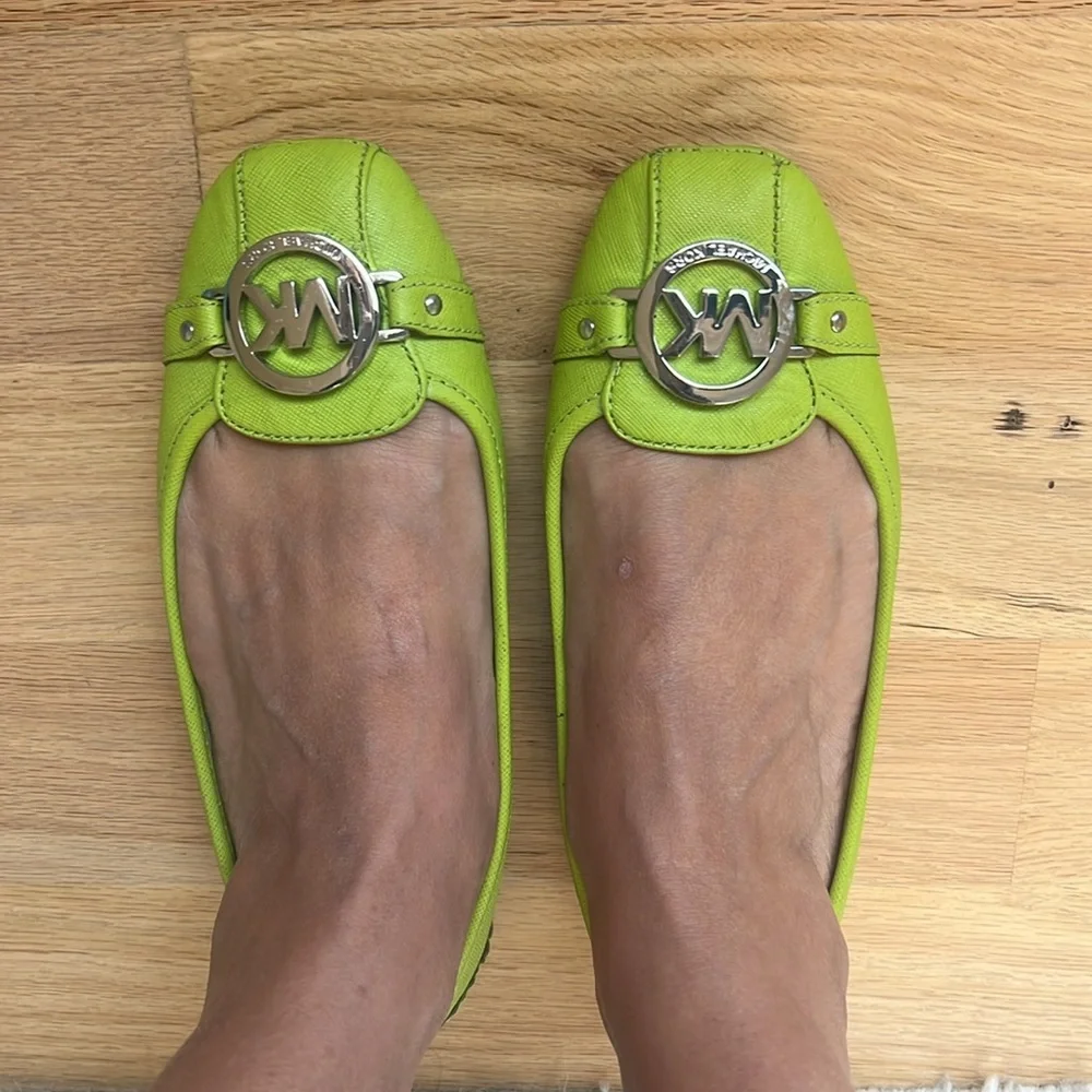Flat Michael Kors shoes.